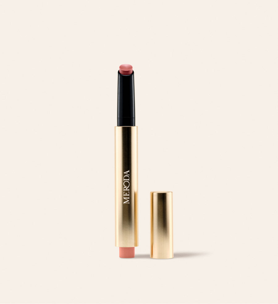 Meroda Cosmetics Hydrating Lip Tint in Dusty Rose featuring a gold applicator pen and a soft mauve pink satin finish.