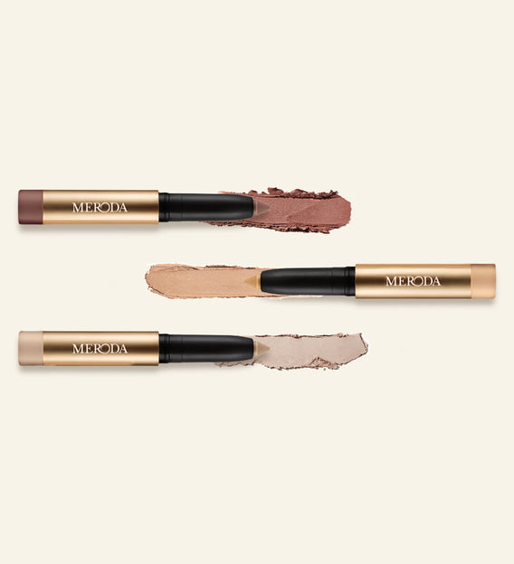 Meroda Cosmetics Mini Eye Shimmer Set featuring three Mini Eye Perfecting Shimmer Stick shades with creamy texture swatches