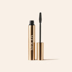 Meroda Cosmetics Gilded Lashes Mascara featuring a gold metallic tube and silicone wand for lengthening and volumizing