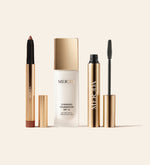 Meroda Cosmetics The Power Trio featuring Changing Foundation, Gilded Lashes Mascara and Eye Perfecting Shimmer Stick in Gold.