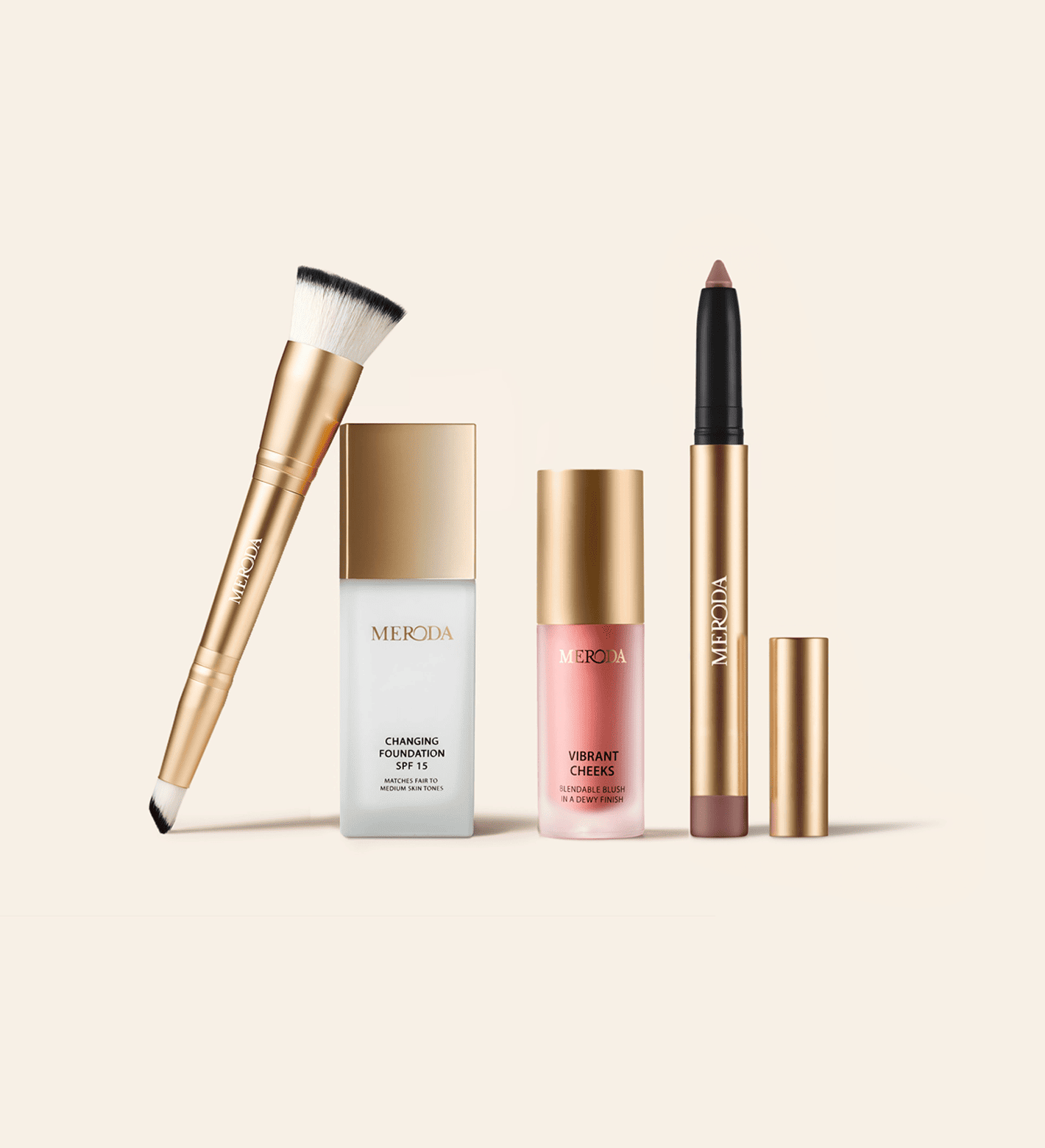 Meroda Cosmetics The Daily Routine Set featuring Changing Foundation, 2-in-1 Build & Conceal Brush, Vibrant Cheek Blush and Eye Perfecting Shimmer Stick on a light background