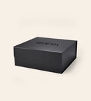 Matte black Meroda gift box with a branded black logo, ideal for premium makeup gifting and presentation.