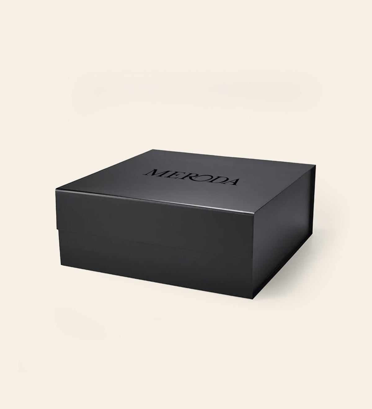 Matte black Meroda gift box with a branded black logo, ideal for premium makeup gifting and presentation.