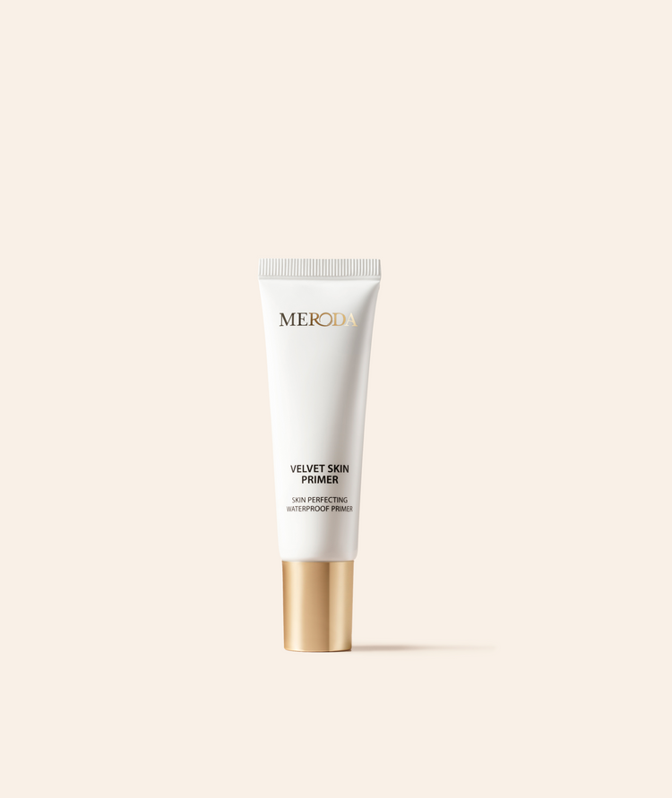 Meroda Velvet Skin Primer in a white tube with a gold cap, a smoothing waterproof base for a flawless complexion.