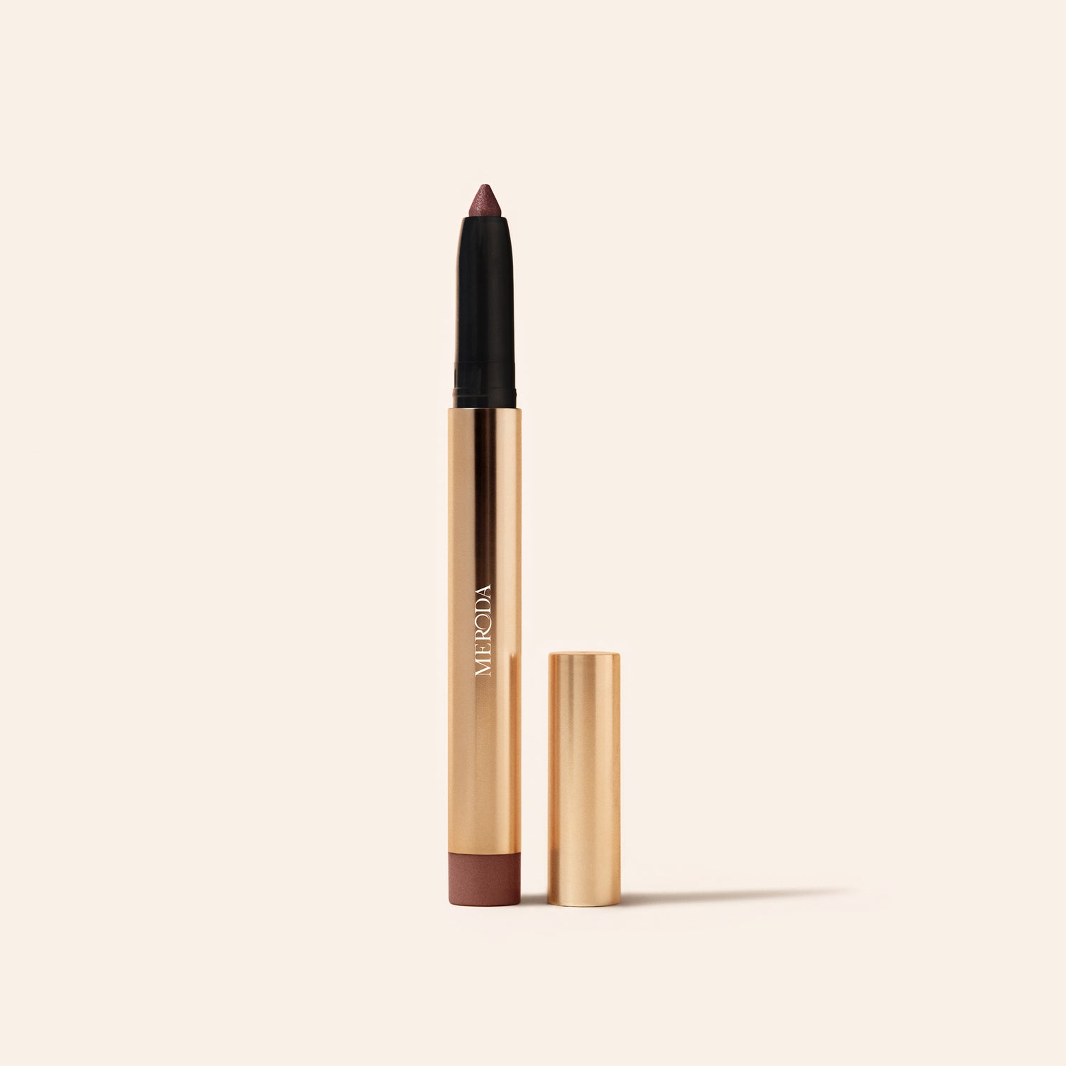 Meroda Cosmetics Eye Perfecting Shimmer Stick in shade Mauve open on a light background