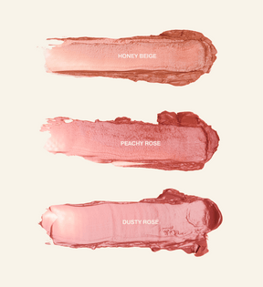 Mini Lip Tint Trio que muestra muestras de textura para los tonos Honey Beige, Peachy Rose y Dusty Rose.